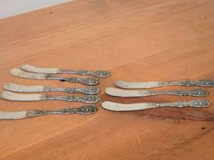 lot 1138 image: Lot of (8) 250-grams (total) Sterling Silver Flat Handle Butter Spreaders - Francis I by Reed & Barton