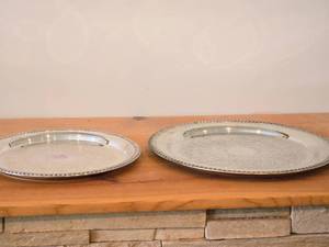 lot 1192 image: Lot of (2) Vintage 1451-grams (total) Silverplated Round Serving Trays - 15  by Fales #1779, 12 by W.M. Rogers #161