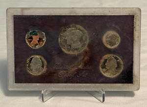 lot 35 image: 1987 Proof Set - some fire damage