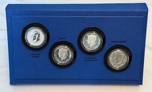 2014 50th Anniversary Kennedy Half Dollar 4 Coin Uncirculated Set - original package with COA