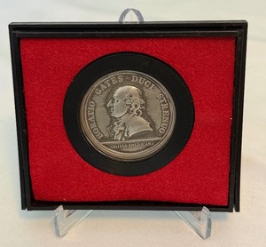 lot 110 image: 1973 General Horatio Gates - Americas First Medals US Mint Pewter Coin - just the case and coin with some  fire damage