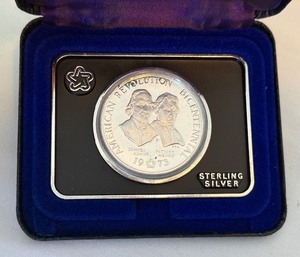 lot 112 image: 1973 Adams & Henry American Revolution Bicentennial Commemorative Medal- original with First Day of Issue stamped on front