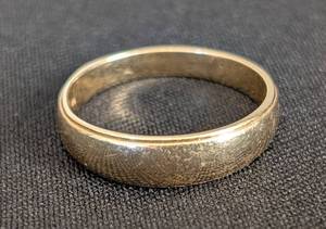 lot 27 image: ML - 14K Gold Ring - Size 10  - Hammered Textured Wedding Band