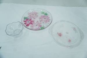 lot 32 image: Crystal Poinsettia Round Serving Platters and Mikasa Christmas Night 6 Footed Bowl