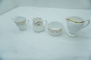 lot 50 image: variety of creamers including Wedgwood and Imperial