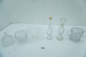 lot 68 image: Avon Regency Candlestick Glare Glass Cologne Bottles, Godinger Shannon Crystal Pineapple Gravy Boat and more