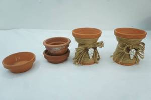 lot 144 image: Small Decorative Terracotta Candle Standsplant stands