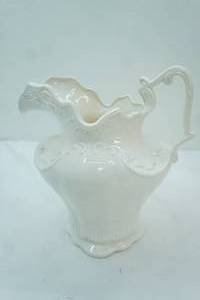 lot 148 image: Vintage Arnels Ceramic White Glaze Mold Embossed Pitcher