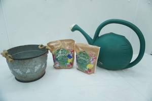 lot 214 image: Galvanized Planter, Plant Food, Poly Watering Can