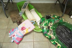 lot 239 image: Antique Cast Iron Scale, NEW Fish Fillet Board, Boat Bumpers, Kids Life Jacket, Snow Sled, Inflatable Raft