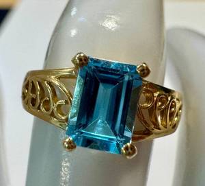 lot 52NP image: Emerald-Cut Blue Topaz Ring in 10K Gold - Size 6, Filigree Band, 4-Prong Setting