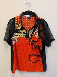 lot 162CH image: Jamie Sadock Womens Polo Top - OrangeBlack Abstract Print, Size M