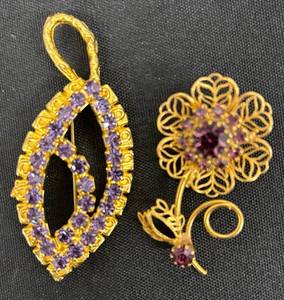 lot 119DZ image: DZ - Two Gold Tone Purple Stone Filigree Brooches