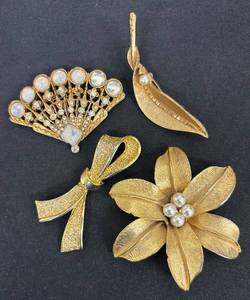 lot 130DZ image: DZ - Four Gold-Tone Brooches With Faux Pearls - Fan, Leaf, Bow & Flower