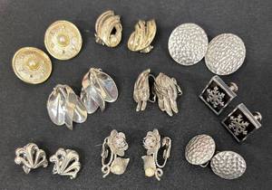 lot 144DZ image: DZ - Nine Pairs Silver Toned Clip-On Earrings