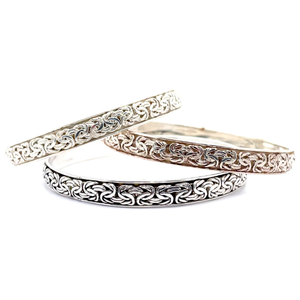 lot 34 image: SET OF THREE Estate Tri-Color Woven Bangle Bracelets VIDEO