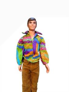 lot 12 image: Mattel Ken Doll 1968 - Colorful Psychedelic Shirt & Tan Corduroy Pants