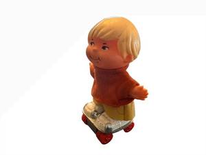 lot 34 image: Small Shots Toy Figure on Roller Skates - Blond Boy in Orange Sweater