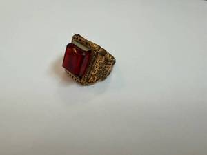 lot 117 image: Captain Midnight Mystic Sun God Ring - Red Rectangular Stone in Ornate Gold-Tone Band