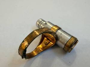 lot 141 image: The Lone Ranger Movie Prop Ring - Silver Cylinder with Gold Band, Film Memorabilia