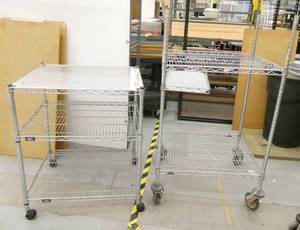 lot 55 image: TWO small metro shelves on wheels