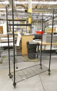 lot 56 image: Wire Shelf cart on wheels