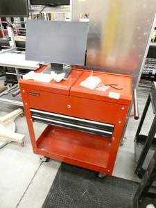 lot 64 image: Red tool box on wheels