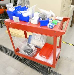 lot 78 image: Red cart full of hardware