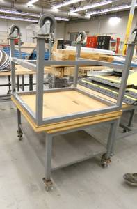 lot 119 image: Two tables on wheels 34x31x30 and 30x38x26