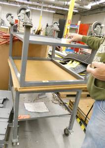 lot 126 image: Two tables on wheels 38x30 and 36x30