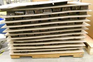 lot 156 image: Pallet full of 300 metal pans for castings