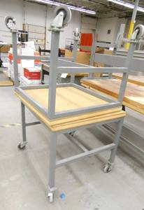 lot 280 image: Two rolling worktables 31x34