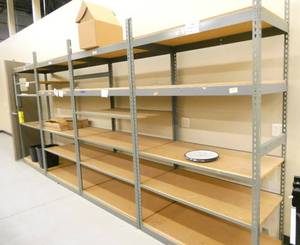 lot 309 image: 4 bays of shelving, these have double sided inner posts so it could Not be split up as 4 separate shelving units