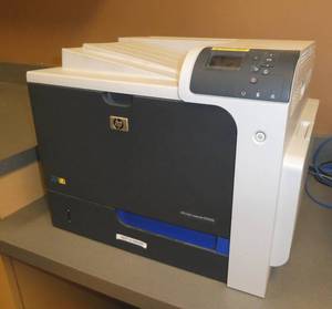 lot 310 image: HP Color laserjet printer model CP4525