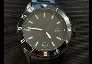 lot 105 image: Lacoste 2011128 Black Dial Dark Blue Stainless Steel Bracelet Mens Watch Case diameter 43.00 mm (Needs Battery. Plastic Is On Face Of Watch)