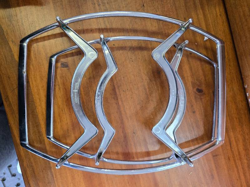 lot 70 image: Corning Wear Trivets