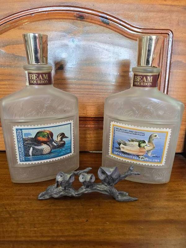 lot 73 image: Spelter Pot Metal Owls and DU Jim Beam Decanters