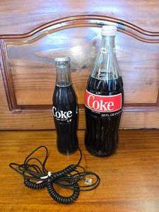 lot 82 image: Coke Phone and Giant Coke Bottle with Coke in it.