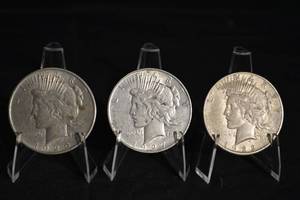 lot 10 image: Peace Dollar Coins - 1925, 1923, 1927(Lot of 3)