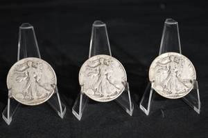 lot 26 image: Three Walking Liberty Half Dollars (U.S. 1916-1947) on Display Stands