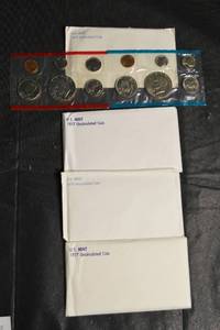 lot 122 image: U.S. Mint Uncirculated Coins - 1975 & 1977 (Assorted Denominations) Lot Of 4