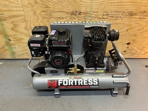 lot 17 image: Fortress 9 Gallon, 135 PSI High Performance Gas Wheelbarrow Jobsite Air Compressor MSRP $1199.99