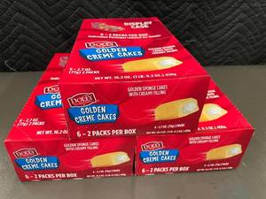 lot 115 image: Cart - Dolly Madison Golden Creme Cakes - 6-2 Packs Per Box Display Case (12 Cakes)