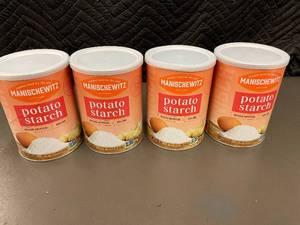 lot 233 image: Manischewitz Potato Starch 16 oz Cans - Lot of 4 (Best By Feb 2025)