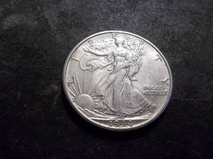 lot 24 image: 1944 D WalkingLiberty Half Dollar From A BU Roll