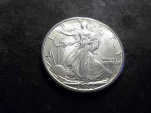 lot 25 image: 1944 D WalkingLiberty Half Dollar From A BU Roll