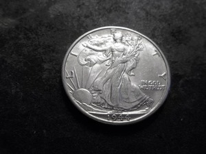 lot 30 image: 1944 D Walking Liberty Half Dollar From A BU Roll