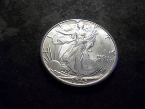 lot 32 image: 1945 D Walking Liberty Half Dollar From A BU Roll
