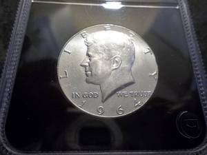 lot 40 image: 1964 Kennedy Silver Half Dollar Holdered UNC
