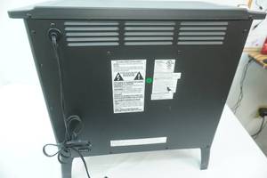 lot 65 image: NEWLIKE NEW Electric Fireplace with Remote. 24x12x23 tall